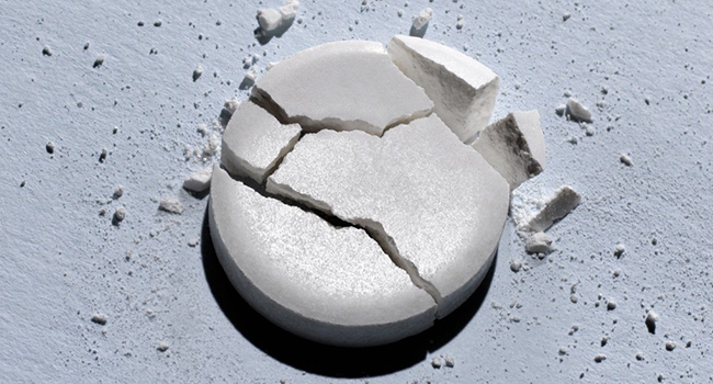 image of cracked methaqualone tablet